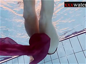 Smoking steamy Russian red-haired in the pool