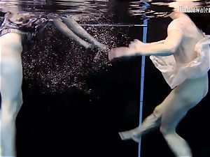 two dolls swim and get bare uber-sexy
